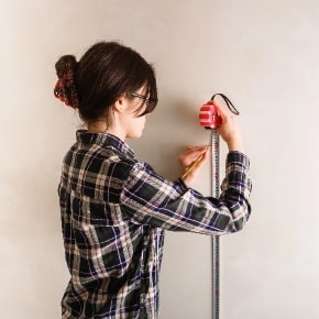 Mark Spot on Wall with pencils to Hang your Canvas